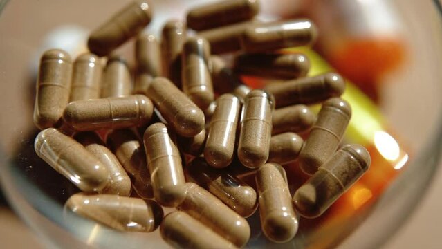 Tablets, capsules, antibiotics. Disease prevention. Treatment for colds and flu. Coronavirus. Receptor drugs. White and green pills.