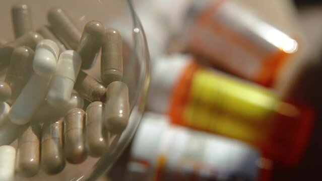 Tablets, capsules, antibiotics. Disease prevention. Treatment for colds and flu. Coronavirus. Receptor drugs. White and green pills.