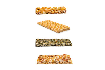 Bar with nuts isolated on a white background. Hazelnut bar.