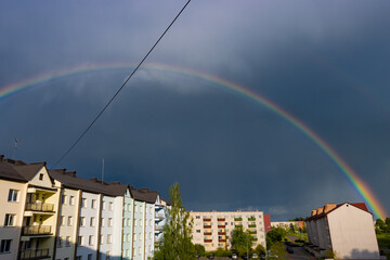 rainbow over city