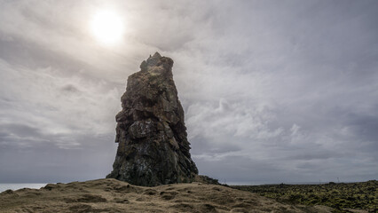Rock Tower on the beach of Iceland