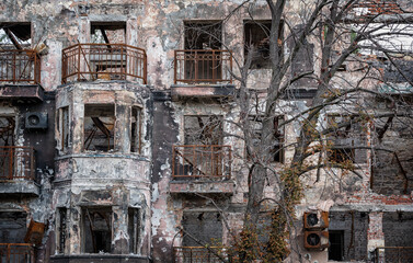 destroyed and burned houses in the city during the war in Ukraine
