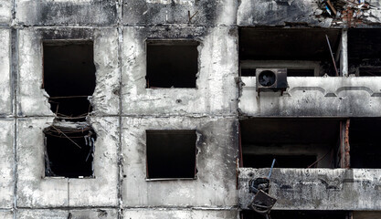 destroyed and burned houses in the city during the war in Ukraine