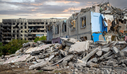 destroyed and burned houses in the city during the war in Ukraine