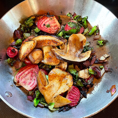 grilled porcini mushrooms with vegetables in a pan