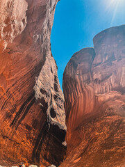 detail of slot canyon with blue sky