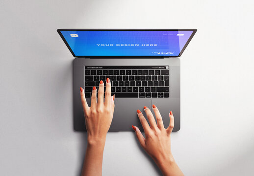 Hands Typing on MacBook Laptop Mockup
