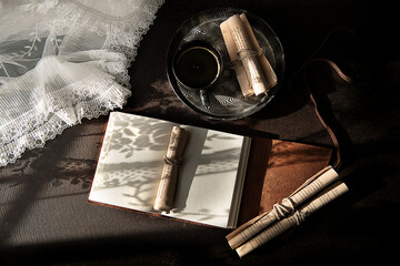 Vintage table with an open journal 