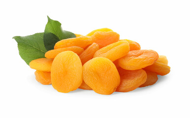 Pile of tasty apricots and green leaves on white background. Dried fruits