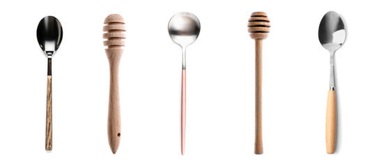 Set of silver and wooden spoons on white background