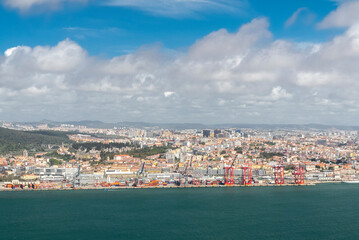 Naklejka na ściany i meble Lisbon, Portugal. April 11, 2022: Panoramic landscape of Lisbon city port