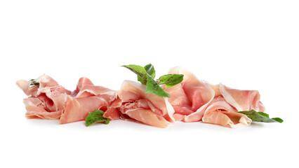 Heap of sliced ham with basil on white background