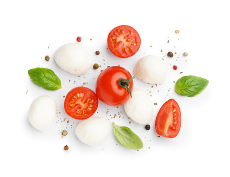 Tasty mozzarella cheese, tomatoes and spices isolated on white background