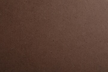Fototapeta premium Texture of kraft paper bag as background, closeup
