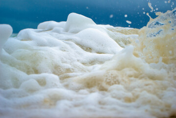 Fototapeta na wymiar ocean waves foam macro 4