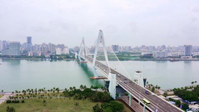aerial view of suspension bridge over zhujiang river in guangzhou