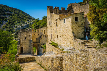 Fototapeta premium View on the medieval castle at the top of the smal village of Saint Montan in the South of France (Ardeche)