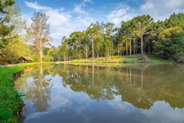 Southern Brazil countryside and lake reflection landscape at peaceful sunset