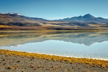 Laguna Tuyajto, salt lake in Atacama desert, volcanic landscape, Chile