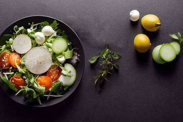 Delicious Salad and Black Copy space Background For Menu Restaurant or Recipe Text and Advisement.