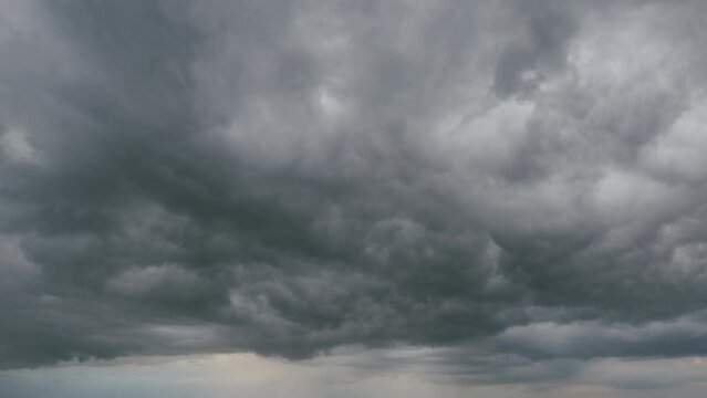 Heavy rain is coming. Cumulus dark clouds harbinger of bad weather and heavy rains. Timelapse.