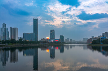 Fototapeta premium Sunset on a pond in the center of the city. Yekaterinburg, Russia