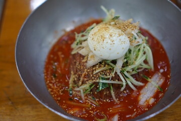Bibim naengmyeon is sweet, sour and spicy.