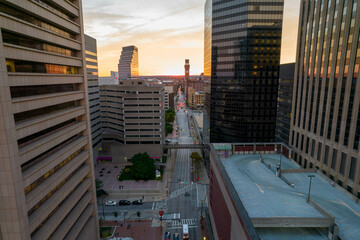 Aerial Drone View of Baltimore City Skyline at Sunset with Building Reflection