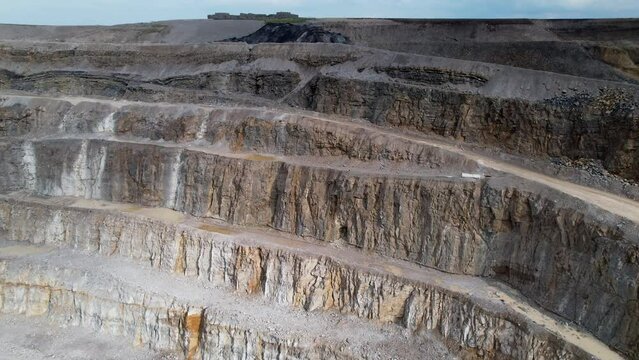 Hanson Aggregates Quarry, Producers Of Crushed Stone, Sand And Gravel Near The Harrogate Town In North Yorkshire, England. - aerial pullback