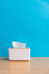 Tissue box on wooden table