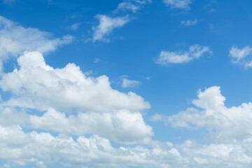 Obraz na płótnie Canvas White clouds on blue sky