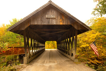 Keniston Covered Bridge in Andover, New Hampshire, with fall colors.