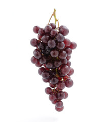 fresh red grapes isolated on a white background
