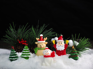 Santa Clause sitting on white snow  with snowbear and friend for created Happiness and funny Christmas and  New Year greeting card, happy and funny concept,