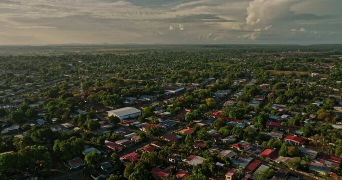 David Panama Aerial v18 panning view drone flyover nuevo vedado and el vedado neighborhoods capturing residential townscape at sunrise with golden sunlight - Shot with Mavic 3 Cine - April 2022