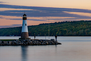 Sunset photo of the Myers Point Lighthouse at Myers Park in Lansing NY, Tompkins County. The lighthouse is situated on the shore of Cayuga Lake, near Ithaca New York.
