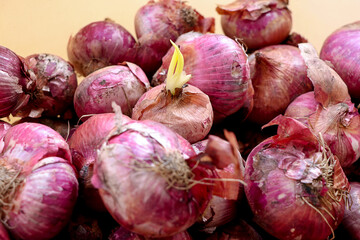 Red onions in plenty on display at local farmer's market, Big fresh red onions background