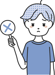 バツの札を持つ男性