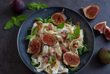 healthy pasta with figs and fresh green basil