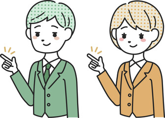 指を差して説明するスーツを着た女性と男性