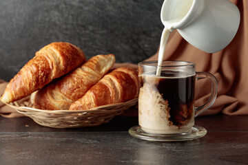 Croissants and coffee with cream.