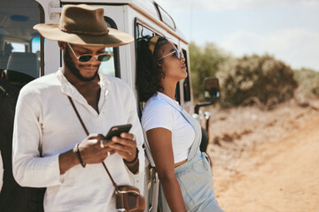 Safari travel, fashion and african couple with car and smartphone for social media update, location...