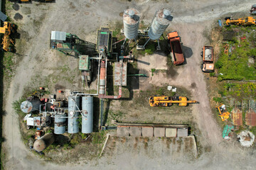 Top view of a derelict and decaying concrete mixing plant in the old part of an abandoned...