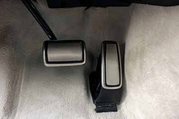 Brake and gas pedals of a luxury car
