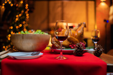 Christmas party food. A celebration dinner with a turkey, wine, champagne on Merry Christmas Eve Xmas on holiday at home. People lifestyle. Thanksgiving day