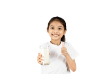 A young Asian girl wear a white T-shirt is smiling. His right hand holds a glass of milk and his left-hand thumbs up with clipping path.