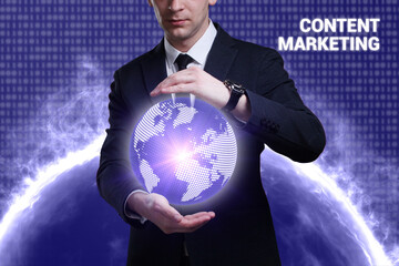 Business, Technology, Internet and network concept. Young businessman working on a virtual screen of the future and sees the inscription: Content marketing