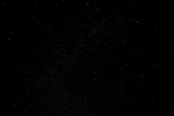Many stars on black sky at night. A real dark night sky with plenty of stars. Night sky background 