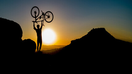 cyclist lifestyle and sunset view on amazing mountains