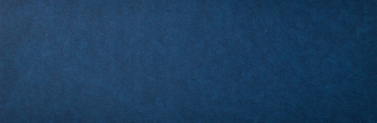 マーブル調の質感のある紺色の紙の背景テクスチャー